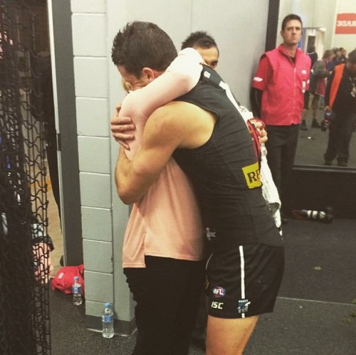 Travis Boak hug